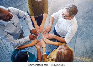 Fun, Collaboration And Teamwork In Hands Linking During Team Building By Diverse Group Of Business People. Above Happy Investors Showing Support, Trust And Motivation While Huddling, Joining