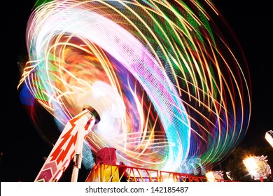 Fun Fair, Long Exposure. Colourful Light Trails.