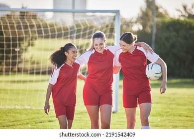 Fun female football players or friends in sportswear hugging, smiling and bonding together after practicing on a field. Young, sport and athletic soccer girls talking about good and exciting match - Powered by Shutterstock