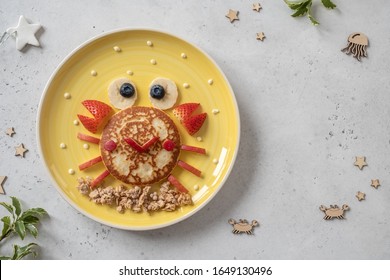 Fun Food for kids. Cute crab and lobster croissants with fruit for kids breakfast