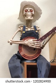 Fun Halloween Decoration - Skeleton Wearing Overalls And Playing The Banjo