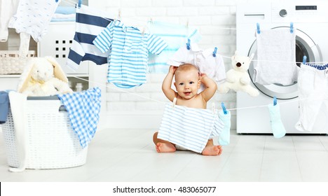 Fun Happy Baby Boy  To Wash Clothes And Laughs In The Laundry Room