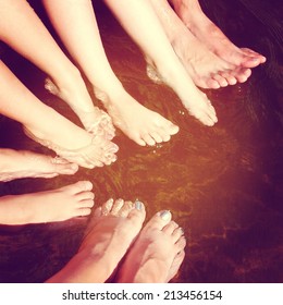 Fun Istagram Of Family Feet In Water Splashing With Effect