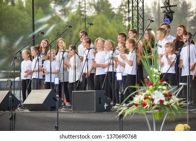 Fun Kids Singing Songs On Stage. Concert In Honor Of The Festival Of Songs And Dances. Rezekne - Latvia, June 2016