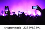 Lot fun people record music video use mobile phone. Fan crowd shoot k pop live concert. Many men hang out cool rave fest. Joy group chill night club hall. Dj star raise hand up. Make neon light photo.