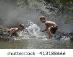 The fun of playing at the river .