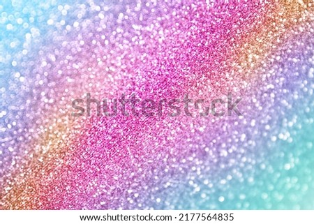 Fun rainbow pink, blue green, purple, yellow color glitter sparkle background, celebrate happy birthday party glittery mermaid invite, princess little girl texture or girly unicorn pony sequin pattern