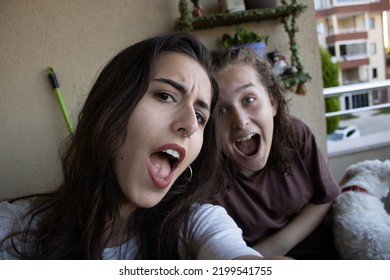 A Fun Selfie Of Two Friends