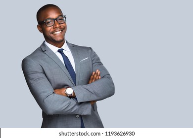 Fun smiling african american businessman in stylish modern suit isolated with copy space