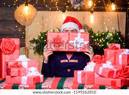 fun time. christmas presents delivery. Boxing day. happy bearded man. hipster santa hat. Christmas shopping. winter shopping sales. holiday celebration. happy new year. Xmas present box.