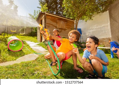 Fun With Water Guns And Garden Hose Sprinkler