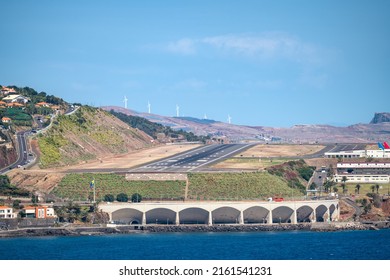 Funchal airport runaway at sunny noon, Madeira - Shutterstock ID 2161541231