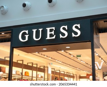 Funchal, Portugal - Oct 23, 2021: Guess Store Sign. Guess Is An American Clothing Brand And Retailer