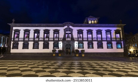 Funchal town hall front view and square with a fountain at night timelapse hyperlapse. Madeira, Portugal. Illuminated historic building - Powered by Shutterstock