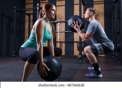 functional fitness workout at the gym with medicine ball - Shutterstock ID 487260628