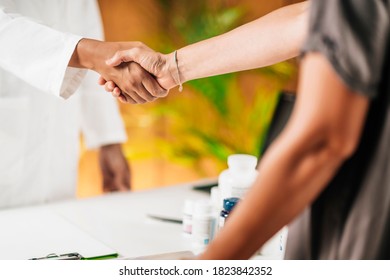 Functional Medicine Doctor Shaking Hands With Patient