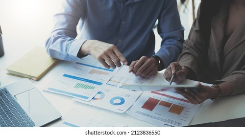 Fund managers team consultation and discuss about analysis Investment stock market by digital tablet. - Shutterstock ID 2123836550