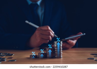 Fund trading concept. Businessman planning long-term investments, buying DCA mutual funds, analyzing economic trends, stock market volatility, taking high investment risks. Fund management, coins. - Shutterstock ID 2259410287