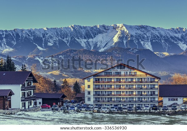 FUNDATA, ROMANIA - DECEMBER 24, 2014: Cheile\
Gradistei Fundata touristic resort. Situated at 35 km from Brasov,\
the complex offers beautiful panoramas of the Piatra Craiului and\
Bucegi mountains.