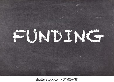 Funding, Concept On School Blackboard Or Chalkboard