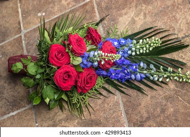 Funeral Bouquet Made Of Red Roses