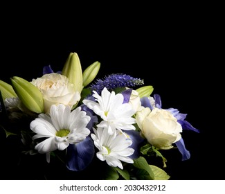 Funeral Bouquet Purple White Flowers, Sympathy And Condolence Concept On Blackbackground With Copy Space.