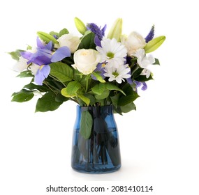 Funeral Bouquet Purple White Flowers, Sympathy And Condolence Concept On White Background With Copy Space.