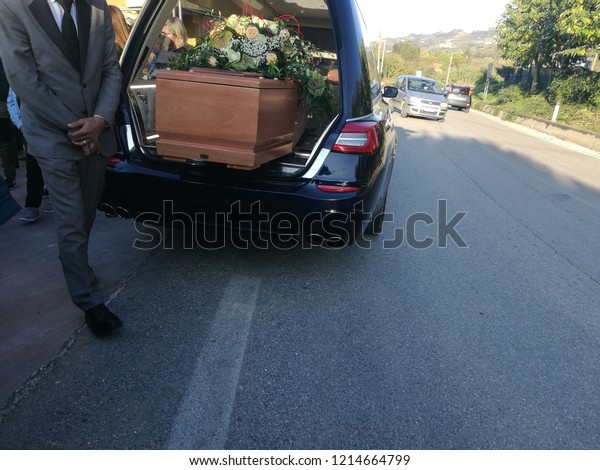 Funeral car with\
coffin