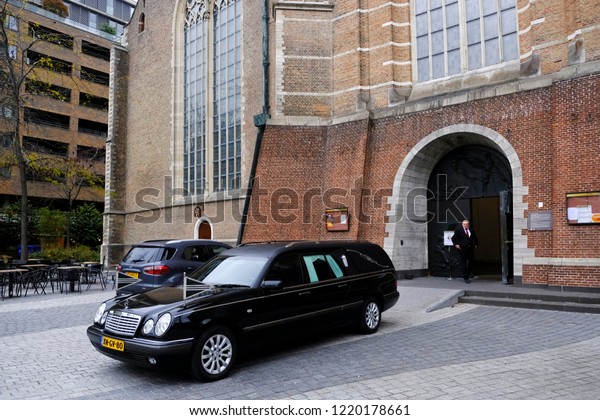Α funeral car parked outside St.\
Lawrence in Rotterdam, Netherlands on Oct. 29,\
2018