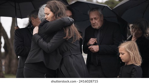 Funeral, crying family and people hug for grief support, mourning depression and death at emotional burial event. Kid child, mom and group together with widow hugging senior mother at coffin ceremony - Powered by Shutterstock