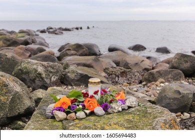 Funeral Flowers Arrangement As Burial At Sea Concept