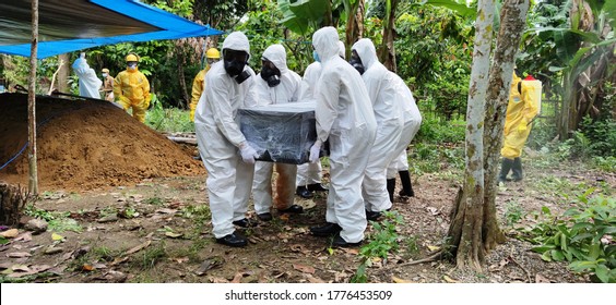 The Funeral Process Of A Corpse Infected With The Corona Virus With The Covid-19 Protocol. (The Funeral Of A Covid-19 Patient)