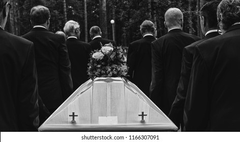 funeral procession and coffin
