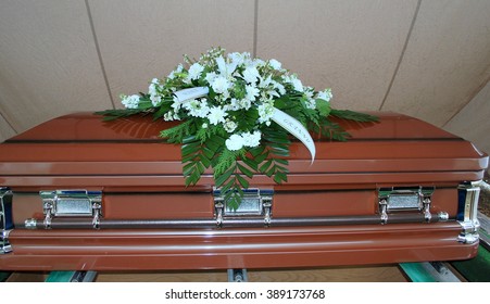 Funeral Service With Casket On Display Outdoors.