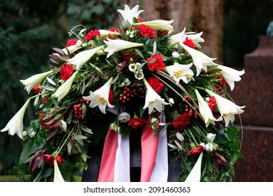 Funeral Wreath With Bow On A Grave After A Funeral