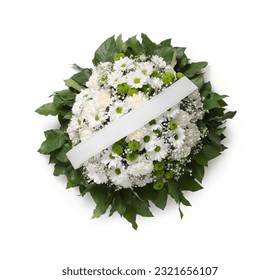 Funeral wreath of flowers with ribbon on white background, top view