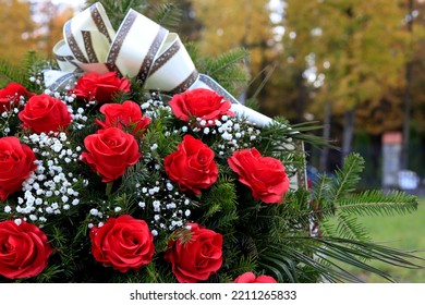 Funeral Wreath With Red Roses. Flower Decoration For The Grave. The Last Good Bye.