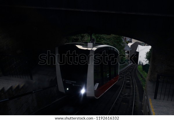 A\
funicular railway car in its way to  Hohensalzburg Fortress in\
Salzburg, Austria on Sep. 21, 2018.The Festungsbahn is a funicular\
railway providing access to Hohensalzburg\
Fortress.