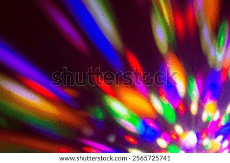Funky colorful light effect generated by moving disco ball light