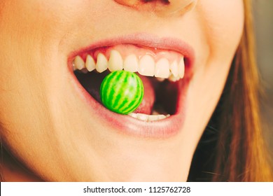 Funky People Concept. Attractive Girl Chewing Gum. Young Woman Has Beautiful Smile And White Teeth. 