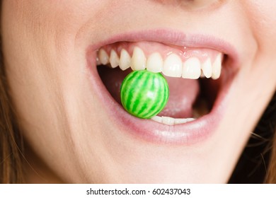 Funky People Concept. Attractive Girl Chewing Gum. Young Woman Has Beautiful Smile And White Teeth. 