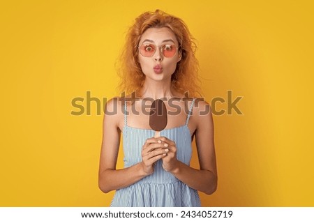 funky woman with icecream in studio. woman with icecream on background.