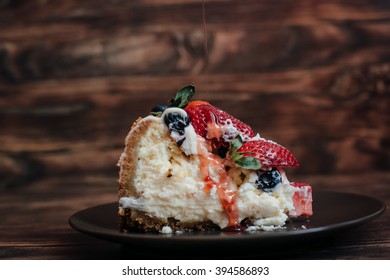 Funnel Cake Cheesecake With Strawberry Syrup