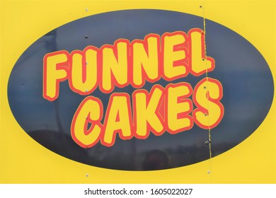 Funnel Cakes Sign On A Food Truck At A Street Fair