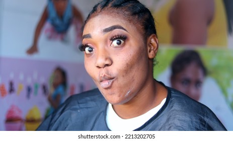 Funny African Woman With Pouted Mouth. Lady With Eyes Wide Open.	