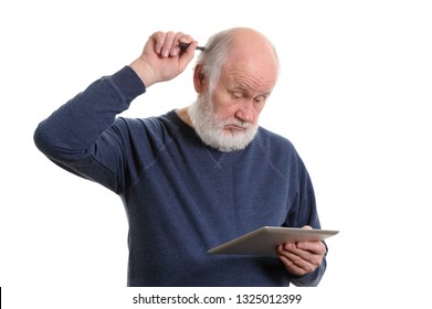 Funny Bald And Bearded Old Man Being Puzzled Using Tablet Computer, Scratching His Head, Isolated On White