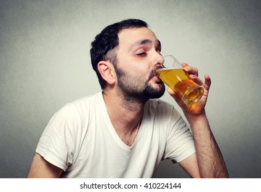 Funny Bearded Man Drinking Beer