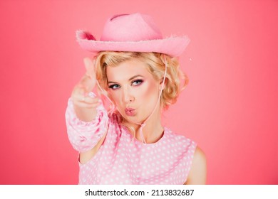 Funny Blonde Woman With Pink Cowboy Hat. Young American Cowgirl Woman Portrait.