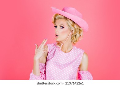 Funny Blonde Woman With Pink Cowboy Hat. Young American Cowgirl Woman Portrait.