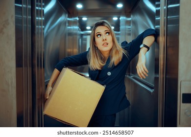 
Funny Businesswoman Carrying a Heavy Box in an Elevator. Stressed busy office worker holding a heavy box of paperwork
 - Powered by Shutterstock